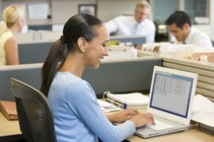 cubicle upsides woman on laptop