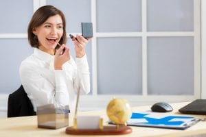 cubicle etiquette putting on lipstick