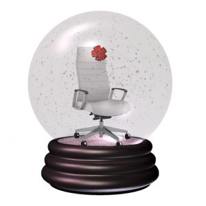 white office chair in snow globe