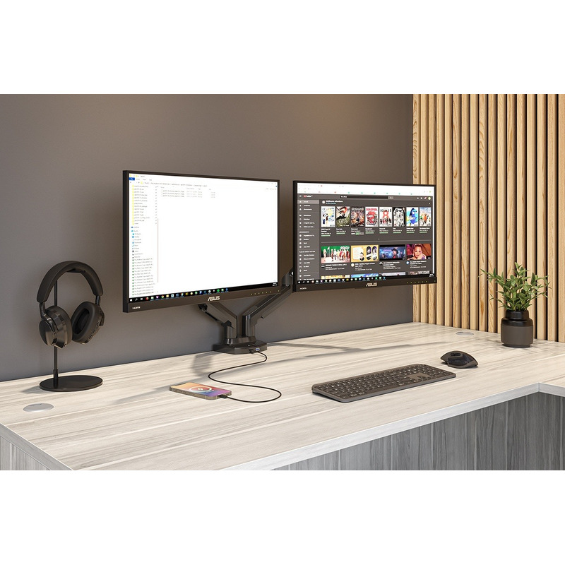 Computer monitor arms by Hawk - shown on a gray desktop