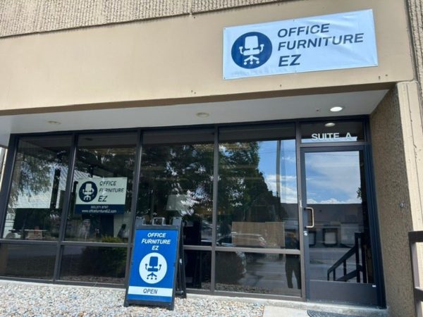 The entrance to Office Furniture EZ at 3860 N Revere Street in Denver