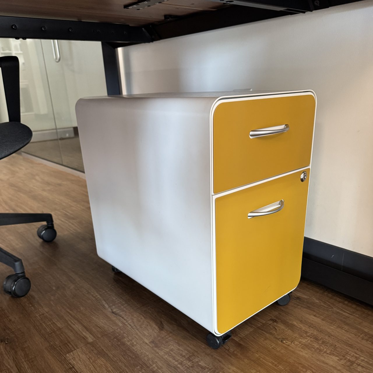 Yellow slim metal mobile pedestal on display at the Office Furniture EZ showroom