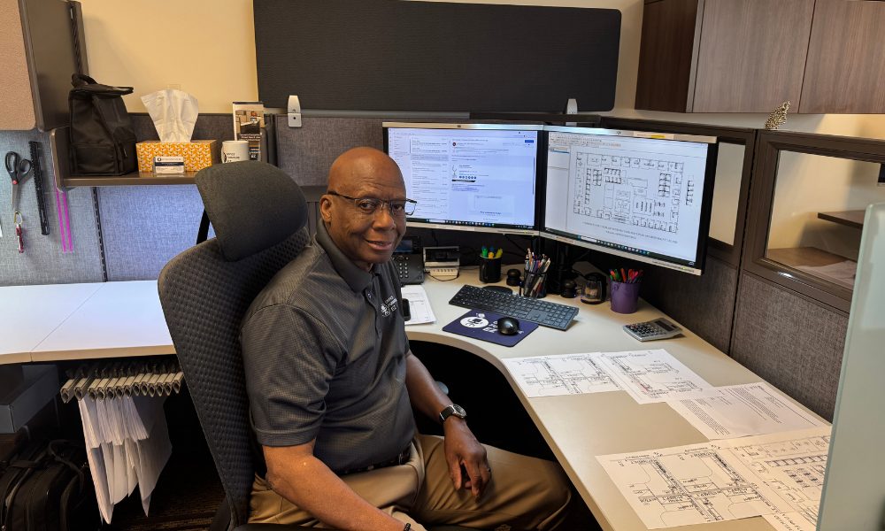 Office Furniture EZ Design Consultant Will Garth in his office at the Denver HQ - preparing a 2D site plan