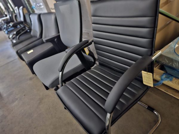 A row of used office chairs