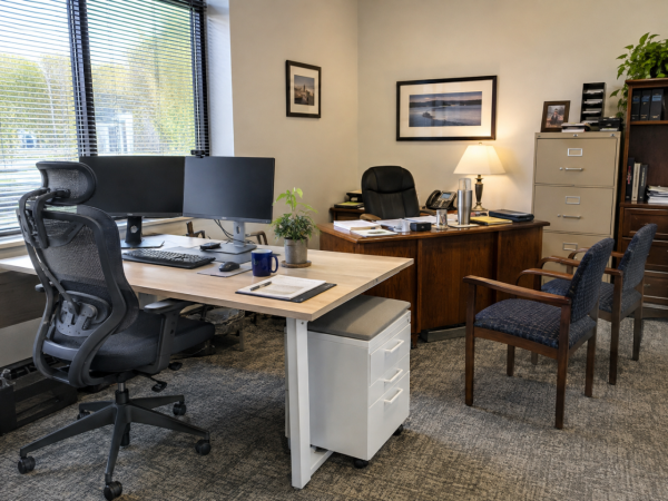 An office with a mixture of dated and new office furnishings - a mistake when buying furnishings