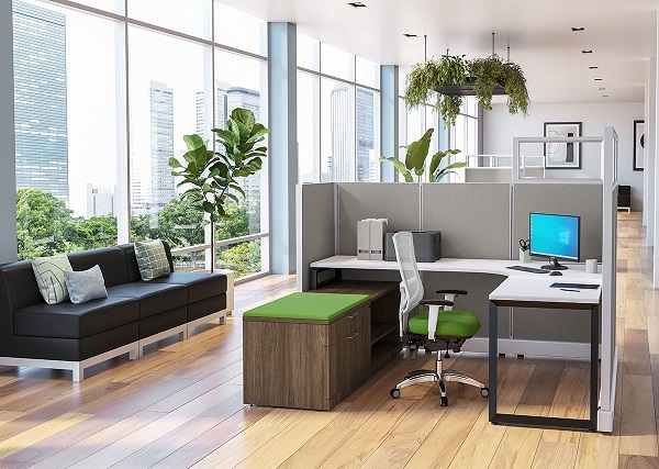 Modern office with cubicle workstation, desk, ergonomic chair and lounge seating