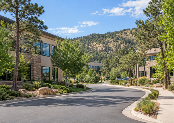 Professional office buildings among mature pines in Rockrimmon, Colorado Springs