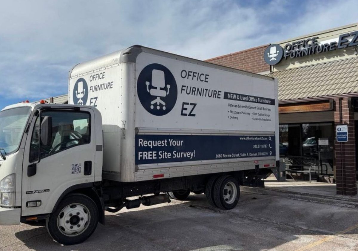 A delivery truck outside of Office Furniture EZ's Colorado Springs Showroom