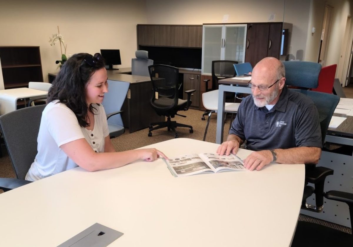 A one to one office furnishing consultation at Office Furniture EZ. Project Manager Gary shown here.